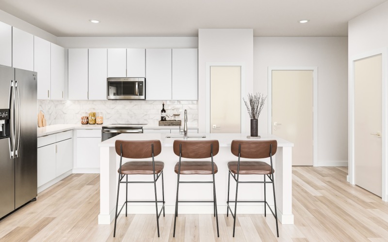 Upscale kitchen with white cabinets in a 2-bedroom apartment in South Austin at Cadena at the Falls