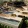 Aerial view of resort-style swimming pool at Cadena at the Falls South Austin apartments