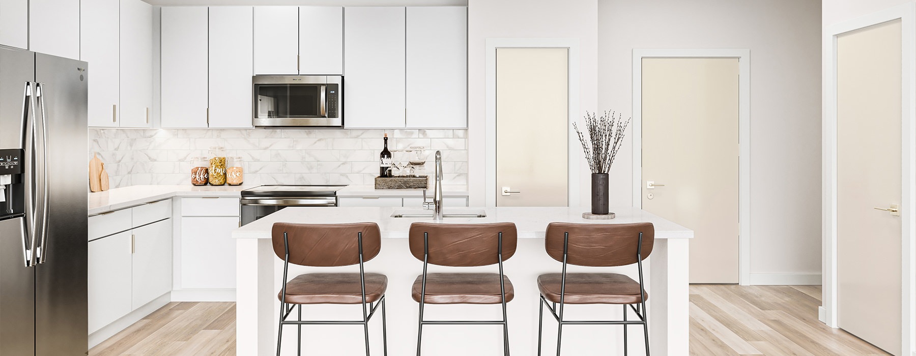 Well-lit kitchen at Cadena at the Falls affordable apartments in South Austin, TX